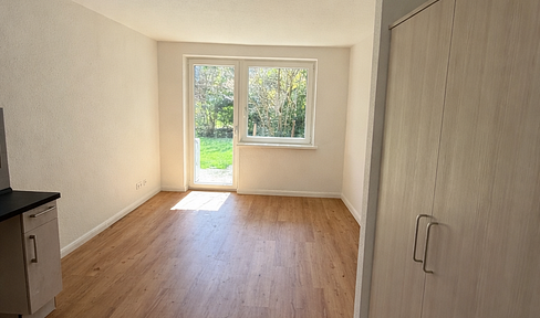 2-room ground floor apartment with a terrace – within walking distance of the train station / First occupancy after renovation.