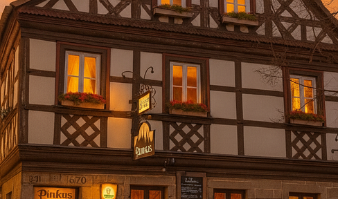 Residential and commercial building in the heart of Lichtenfels's old town.