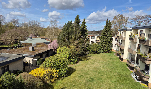 Well-maintained 2-room apartment with a distant view of the greenery and a parking space in an underground garage, located in Hannover-Mühlenberg.