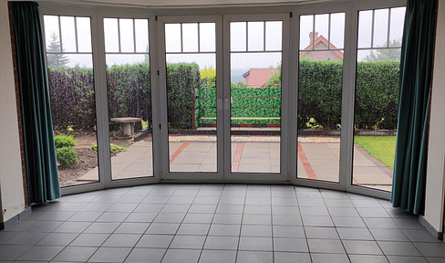 Ground floor apartment with a small garden and a wonderful view.