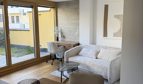 Erstklassig wohnen im Lehel: Möblierte, moderne Wohnung mit Balkon & Dachgarten