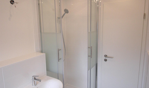 3-room apartment with balcony and garden – renovated, quiet location, fitted kitchen.