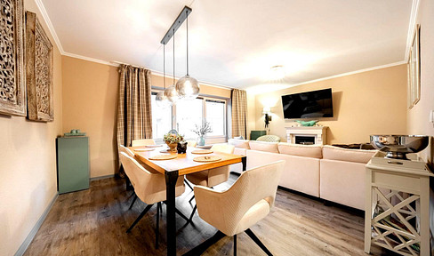 High-quality furnished apartment near Emden / Aurich / Norddeich, with a large terrace and parking spaces.