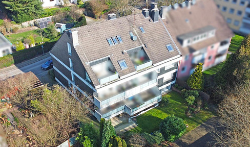 Charming 2.5-room apartment with a large terrace and parking space.