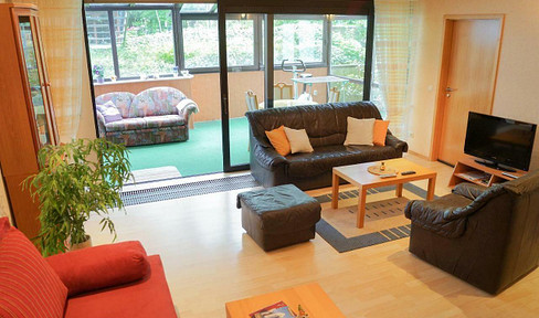 Apartment with a winter garden and access to a garden, located in the basement, in Schildgen, Bergisch Gladbach.