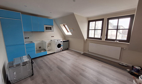 First occupancy! Stylish 3-room apartment in a prime location in Rüdesheim, with a kitchen.
