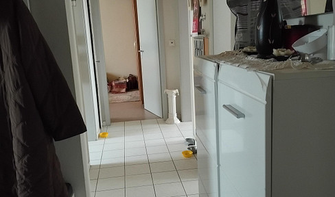 Beautiful 4-room apartment with garden, balcony, and parking space.