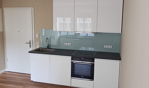 Excellent 2-room apartment in a prime location in Rüdesheim, featuring a fitted kitchen.