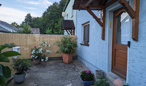 Charming house with a beautiful view, situated on a hillside.