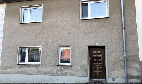 Terraced house for sale.