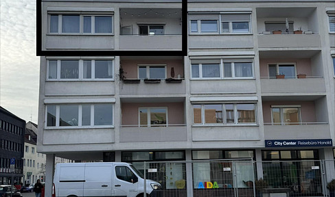 3-room city apartment with a view of Münster, located at the Glacis Galerie.