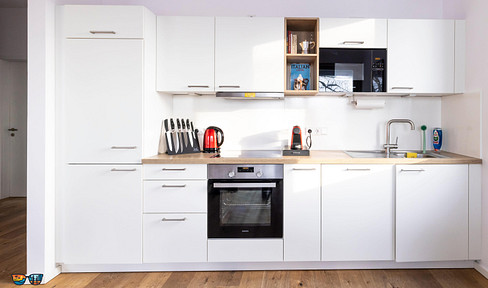 Brand new 3-room apartment (94.52 m²) with a kitchen, balcony, and parking space in Wildau, near Berlin.