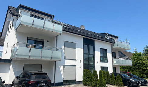 Modern apartment with balcony, underfloor heating, and parking space – quiet and conveniently located near the city center in Waldbröl.