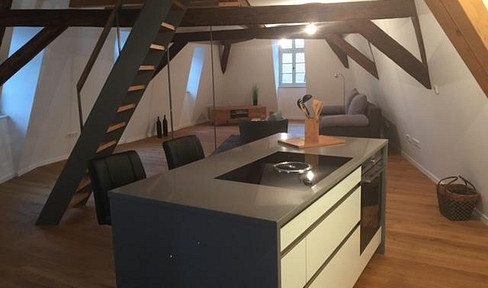 Renovated apartment in a historic building, available furnished or unfurnished, located in the heart of Kronberg.