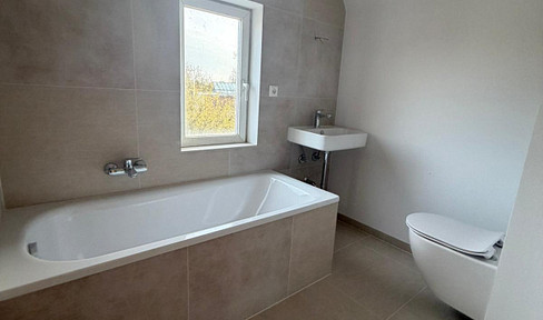 Renovated single-family home with modern interior finishes.