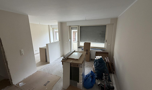 First letting after complete renovation | Bright, open apartment with fitted kitchen and genuine hardwood parquet flooring.