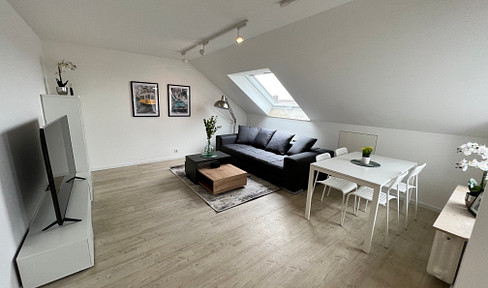 2-room apartment in a prime, quiet location, with a balcony, garage, and furnished.