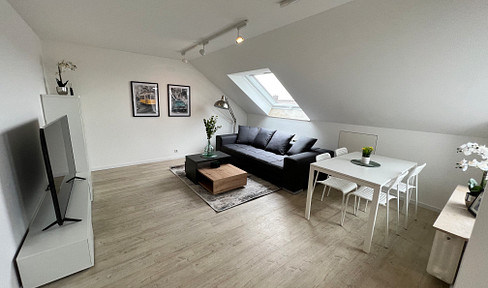 2-room apartment in a prime, quiet location, with a balcony, garage, and furnished.