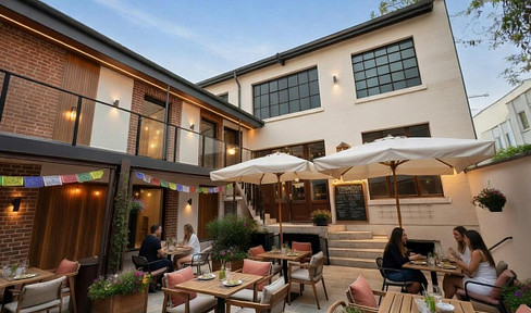 Backyard area near the Hofgarten, with potential for expansion.