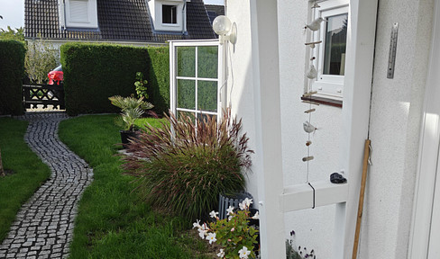 Gallery-style apartment building with a small, private garden on its own land - no commission fees.