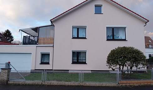 Well-maintained two-family house with a photovoltaic system, sauna, and double garage, located in a central area of Bremen-Blumenthal.