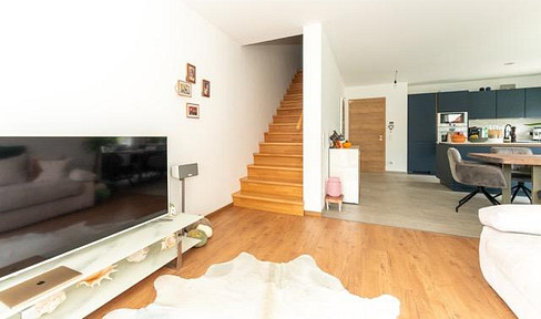 Immediately available – KfW 40 standard, with garden and 2 parking spaces.