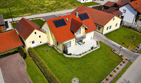 Representative single-family home with a separate commercial building, including a workshop/warehouse.