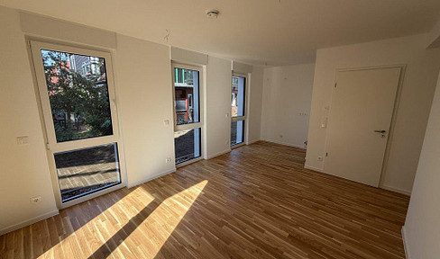 Your new home in a green setting: Newly built 2-room apartment with a garden.