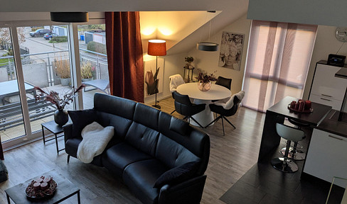 Attractive 4-room maisonette apartment. Price includes parking space in the building's garage and an outdoor parking space.