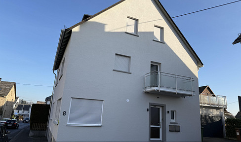 Attractive two-family house – an investment property with future potential, or a flexible multi-generational home.