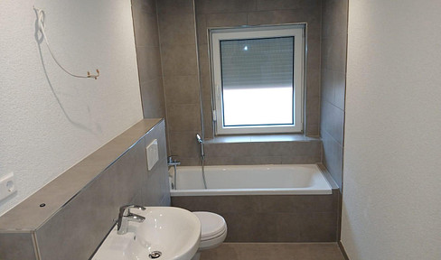 4-room apartment + parking space.