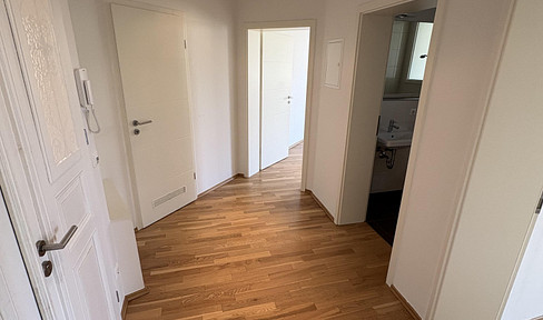 Bright, modern 2-room apartment with a balcony and fitted kitchen.