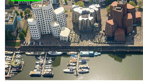 High-yield investment property in the Düsseldorf harbor area – directly opposite the Gehry buildings, furnished, and commission-free.