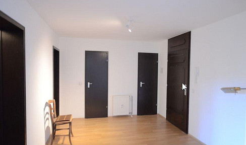 Kronberg - 2.5-room apartment in a quiet, central location, with a balcony, garage, and fitted kitchen.