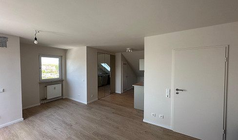 Modern studio apartment with a rooftop terrace.