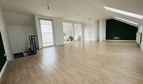 Bright maisonette apartment with a rooftop terrace.