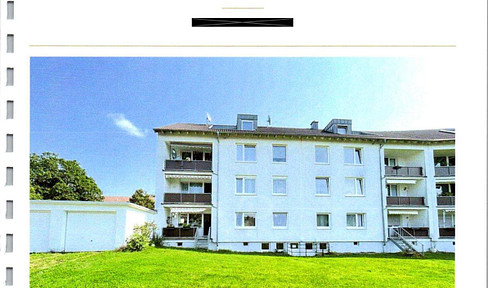 Sunny 4-room ground floor apartment with balcony and garden access, located in a desirable residential area.