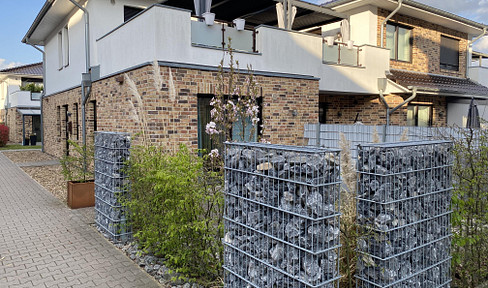 Moderne 2-Zimmer-EG-Wohnung mit Terrasse, Gartenanteil & Garage