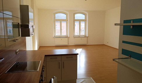 3.5-room maisonette apartment in a historic building, featuring high ceilings and including a parking space.