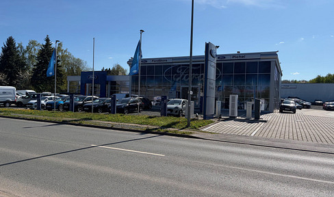 Showroom and service property with ESG standards and high foot traffic.