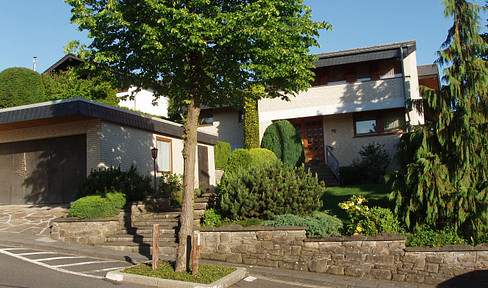Exceptional architect-designed villa, offered for sale through a commission-free bidding process.