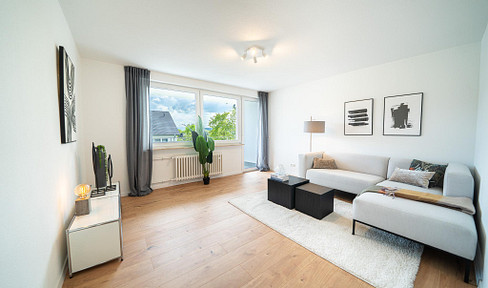 Modernized 3-room apartment with a south-facing balcony, elevator, and garage, located in a quiet area of Koblenz-Asterstein.