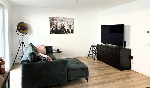 Modern 3-room ground floor apartment with balcony.