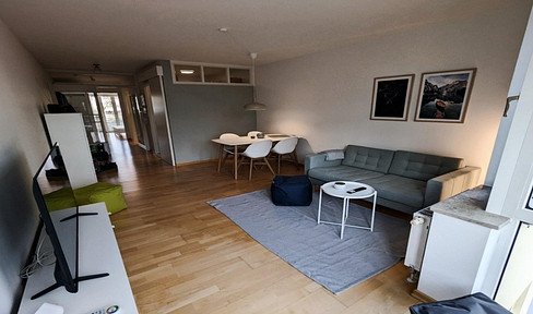Bright, furnished 2-room apartment near the Olympic Park, with a parking space in a garage.