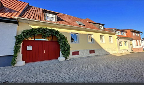 House with a Mediterranean feel, featuring a large terrace, outdoor pool, and a separate apartment.