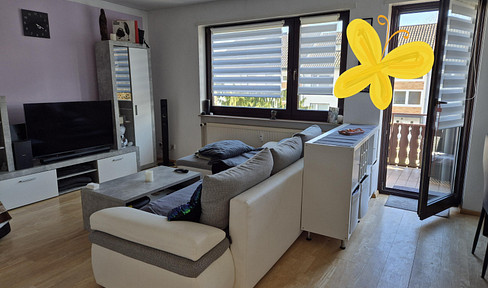Beautifully renovated 3-room apartment in Güdingen, with a fireplace for a cozy atmosphere and a balcony.