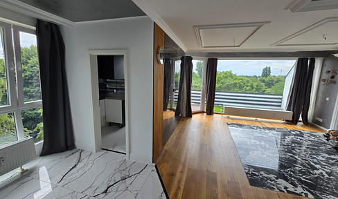 Modern penthouse apartment with 3 rooms.
