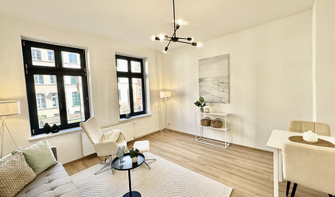 Immediately available: Modernized 2-room apartment with a terrace in the old town of Wismar.