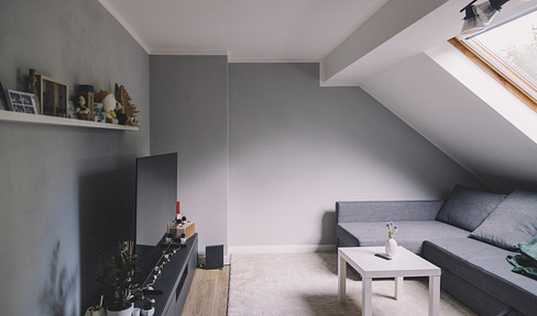 Charming 2-room apartment in the attic of a stylish, historic villa – central location with views of the Kinzig River.