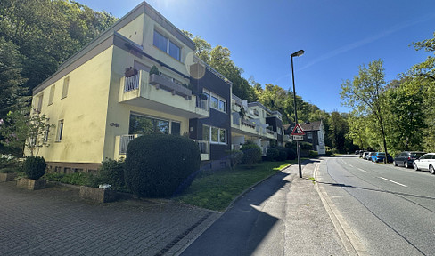 Attractive 3-room apartment in Essen-Werden, with a view of the Ruhr River, a balcony, and a garage.